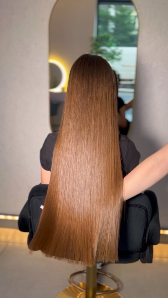 Keratin smoothing result — sleek hair after treatment, Prague studio